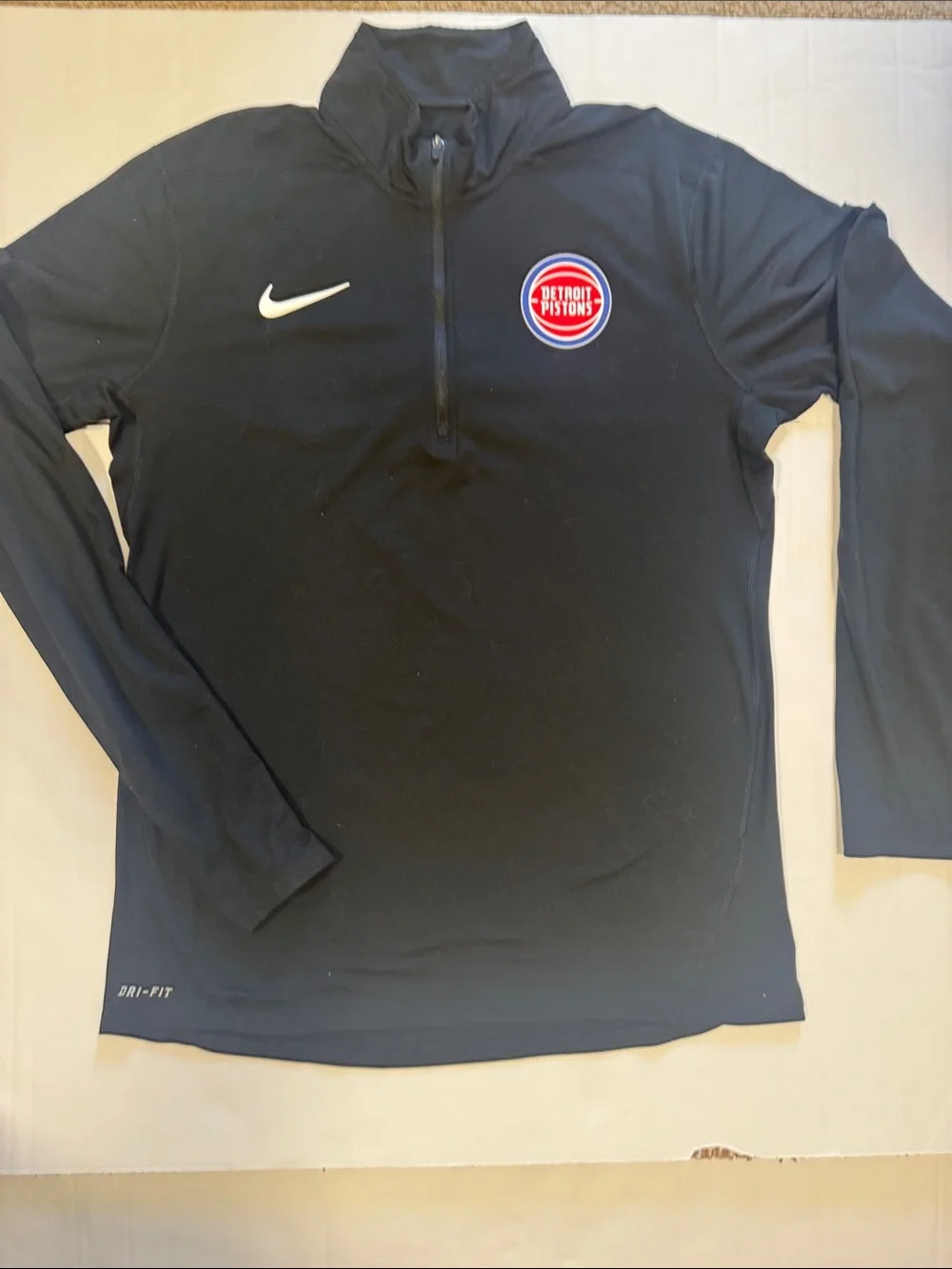 Nike Men’s Black Detroit Pistons Dri-FIT Quarter-Zip Rash Guard